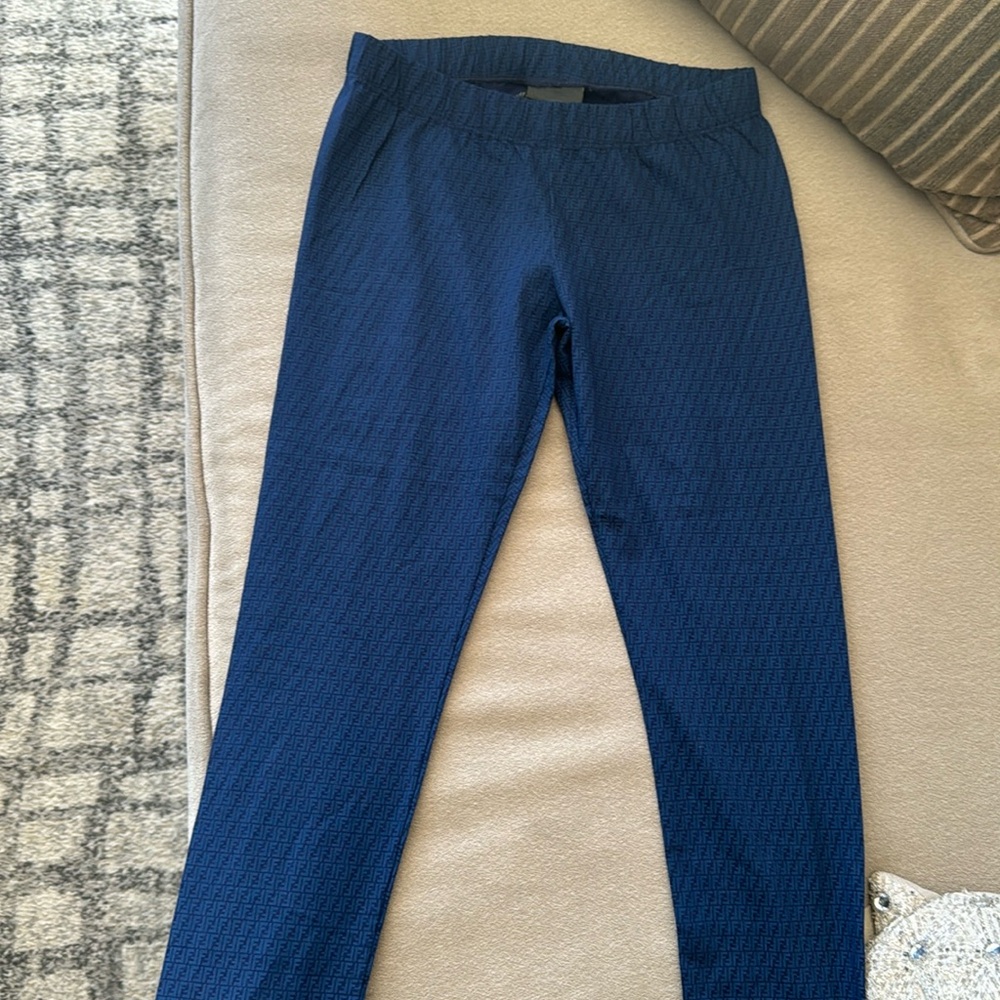 Never worn and great condition! Bought to wear with an outfit but never did.